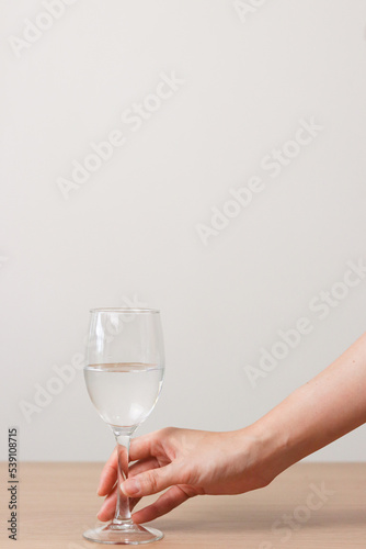 Holding wine glass
