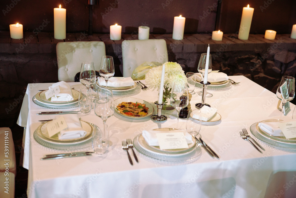 Decorated plate with fork and spoon. wedding Table restaurant Decorated plate with fork and spoon. wedding Table restaurant