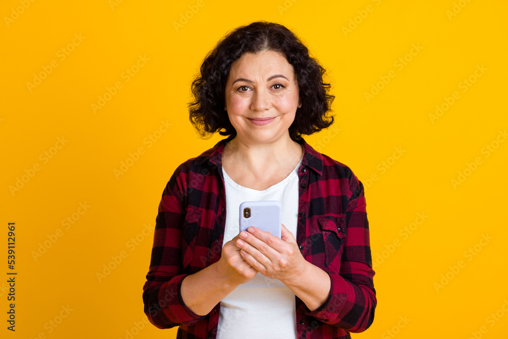Photo of old lady use smartphone read social network news share comment subscribe isolated over bright color background Photo of old lady use smartphone read social network news share comment subscribe isolated over bright color background