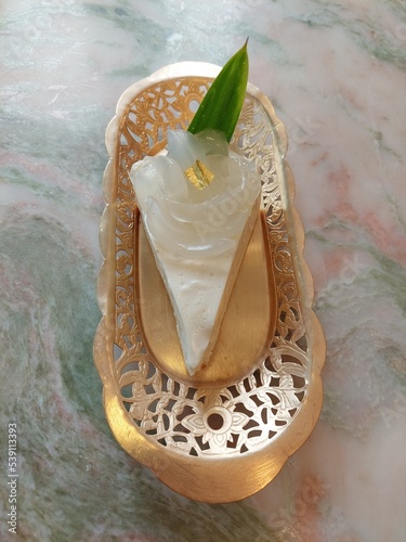 Coconut and Toddy Palm lies on plate photo