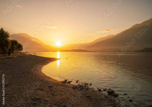 Fototapeta Naklejka Na Ścianę i Meble -  Beautiful warm sunrise at Lake Como, Italy