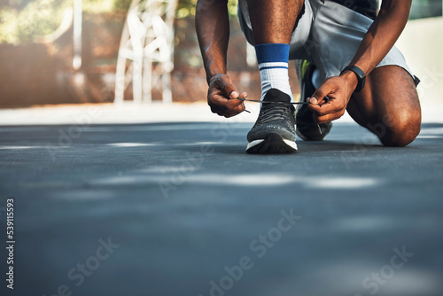 Sport, fitness and shoes of runner before exercise and morning cardio in city, lace tie, feet and closeup. Health, wellness and sneakers of man before running outdoor for training, health and workout