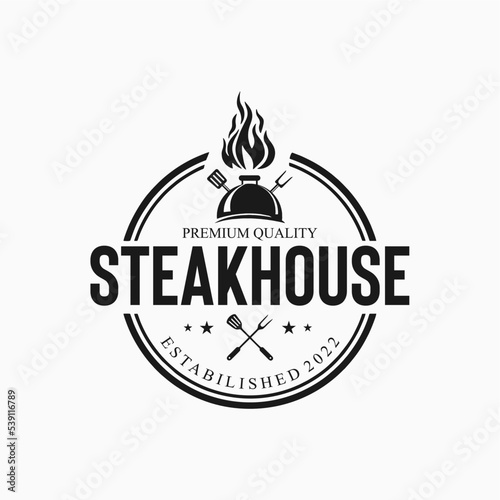 Steakhouse retro logo. Steak with fire flame. Barbecue restaurant logo, emblem, poster. Vintage design. BBQ Vector template logo.