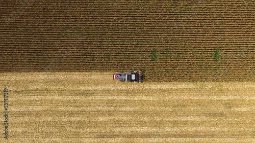 Aerial view of a harvester in sunflower field