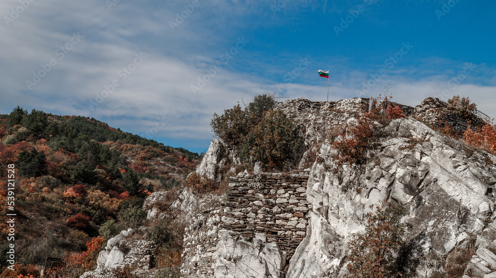 The medieval Asenova fortress and the Church of the Holy Virgin Petrichka in Bulgaria in autumn