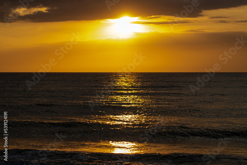 crimson sunset over sea