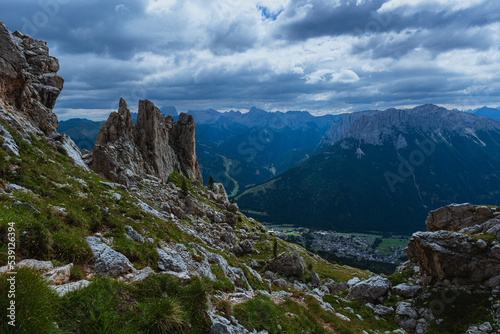 The landscape and the peaks of the Dolomites of the Val di Fassa, one of the most famous and touristic valleys of Trentino, near the town of Canazei, Italy - August 2022. © Roberto