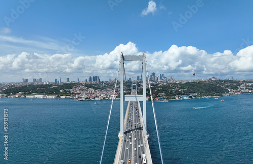 Photography Istanbul Bosphorus Bridge and City Skyline in Background with Turkish Flag at Be