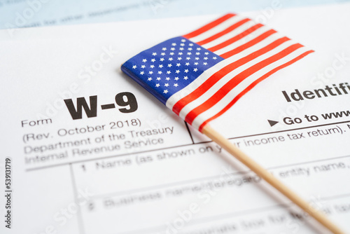 Tax form W-9 Request for Taxpayer Identification Number and Certification, business finance concept. photo