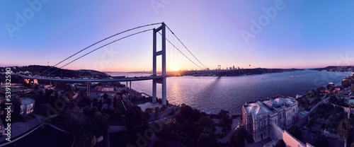 Canvas Print Istanbul Bosphorus Bridge and City Skyline in Background with Turkish Flag at Be