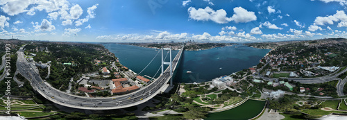 Print op canvas Istanbul Bosphorus Bridge and City Skyline in Background with Turkish Flag at Be