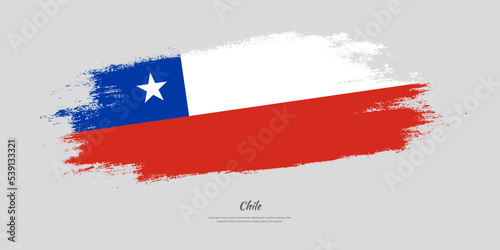 Happy Independence Day of Chile. National flag on artistic stain brush stroke background.