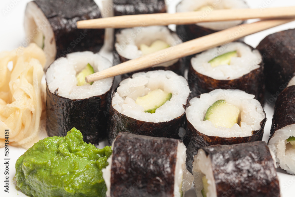 Sushi rolls cucumber japanese food on white background. Sushi rolls cucumber japanese food on white background.