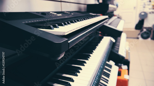 Photography Modern synthesizer keyboards side view