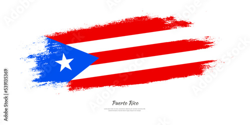Happy Independence Day of Puerto Rico. National flag on artistic stain brush stroke background.