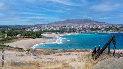 Foto view to the beach and port of Rafina city in Greece