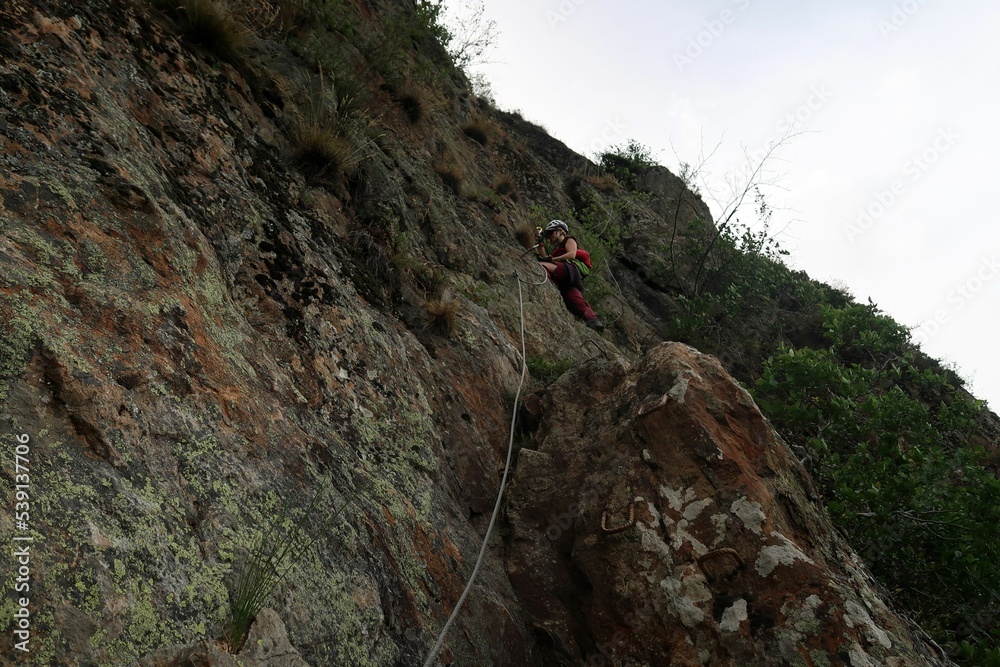 Hiking and via ferrata next to the village of Les Deux Alps, in the french Alps. There is some walking through the forest where you see structures of the old mining activities.