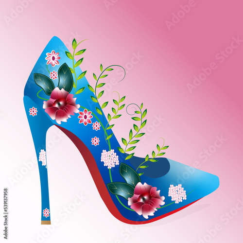 Blue stiletto with floral decoration.  Shoes and flowers