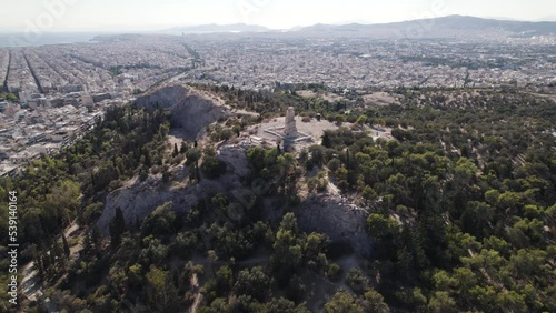 Aerial view of Philopappos Monument on top of Muse Hill, ancient Greek mausoleum in Athens photo