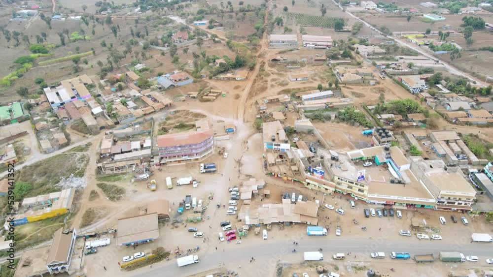 Cityscape-drone view drone flying in the small village of Loitokitok small town in Kenya Africa. Drought in Kenya in rural Africa- Climate change- Poverty Cityscape-drone view drone flying in the small village of Loitokitok small town in Kenya Africa. Drought in Kenya in rural Africa- Climate change- Poverty