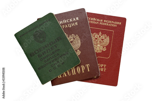 Two passports and a military ID photo