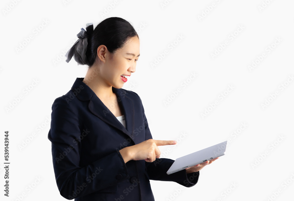 Asian businesswoman in black jacket using tablet computer touching watching and chatting white backgrond.
Asian businesswoman in black jacket using tablet computer touching watching and chatting white backgrond.