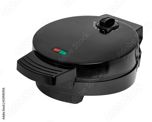 black waffle iron close-up. household appliances for the kitchen