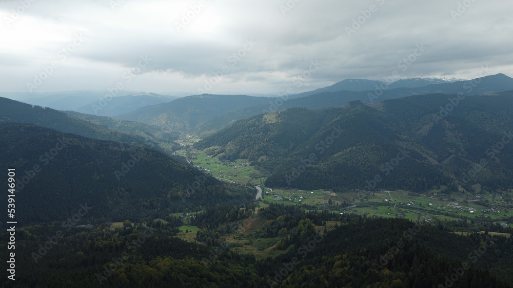 Panorama of the beautiful mountains. Village in the valley.