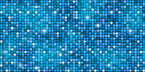 Bright shiny blue sequins or paillettes on fabric