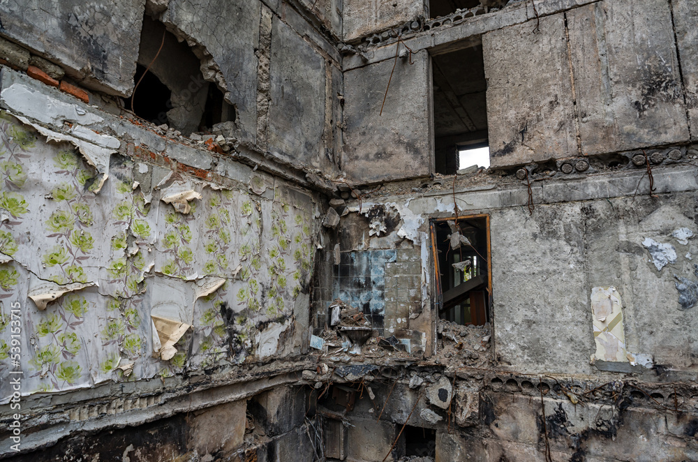 destroyed and burned houses in the city during the war in Ukraine