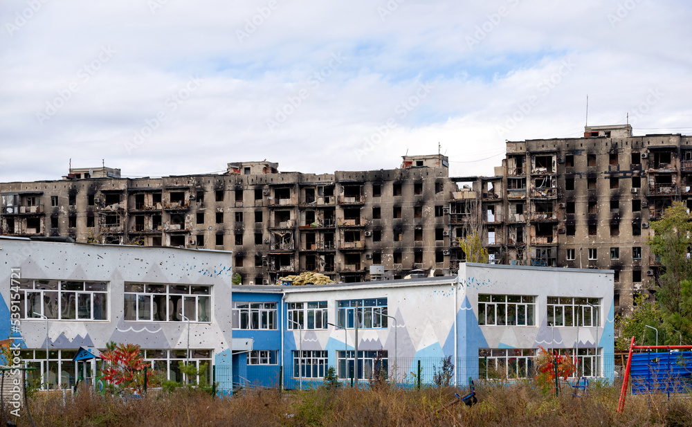 destroyed and burned houses in the city during the war in Ukraine