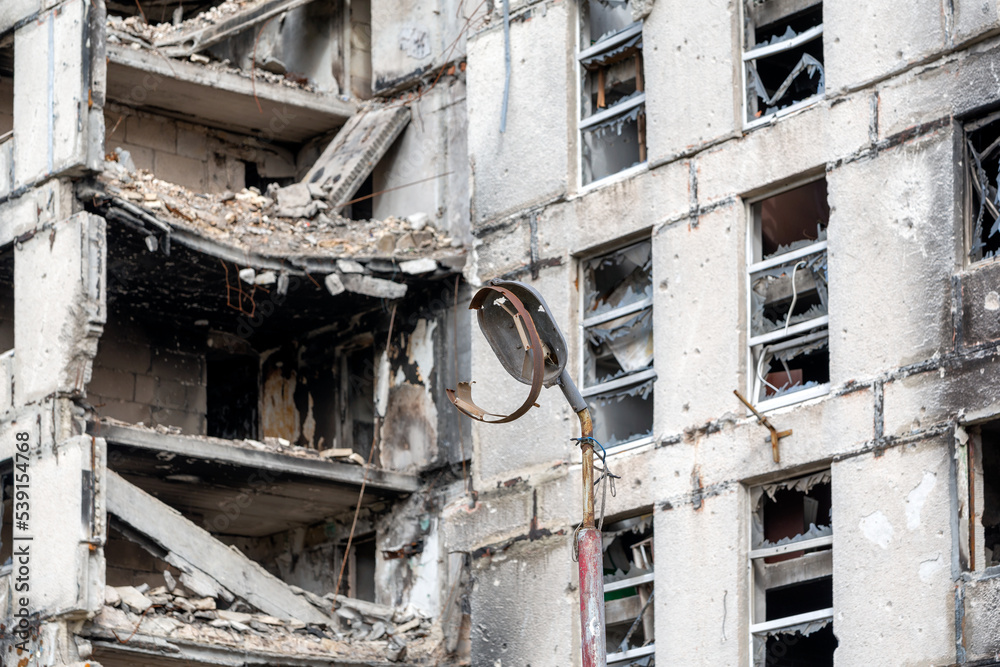 destroyed and burned houses in the city during the war in Ukraine