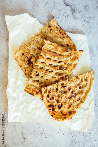 Sangak. A Persian (Iran) bread made with a sourdough starter and baked on a bed of small river stones in an oven