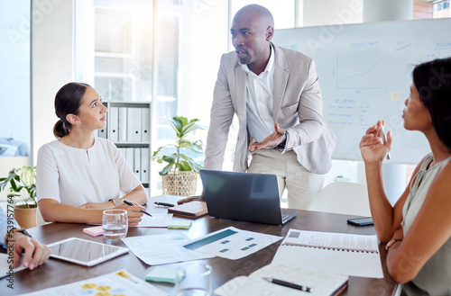 Business, black man and speaker, presentation leader and planning with business people in meeting. Diversity, laptop and paperwork, talking and listening to corporate pitch and project strategy.