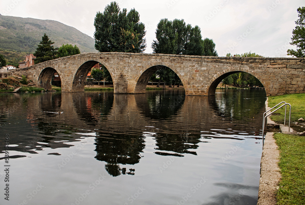 Old stone bridge over river