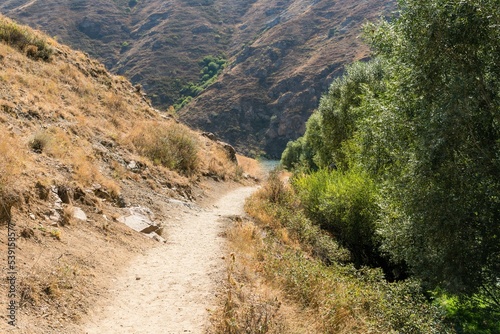 Narrow path in the gorge among the rocks in the mountains of Armenia.