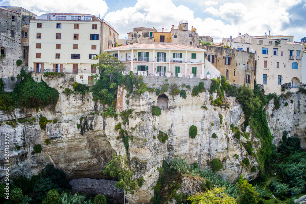 historic buildings on a cliff in the city of Tropea