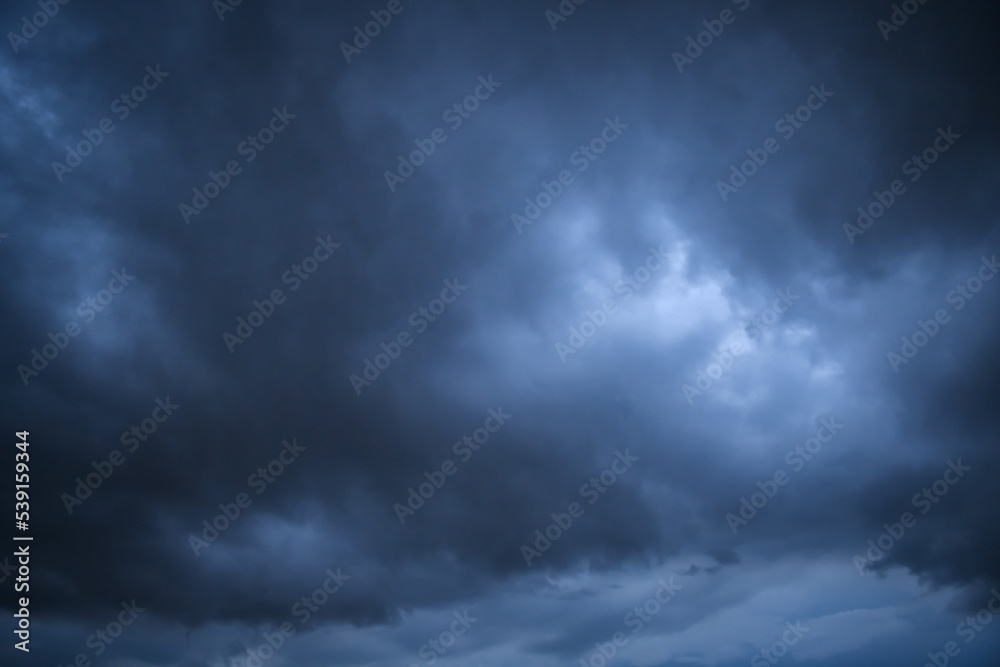 Storm clouds floating in a rainy day with natural light. Cloudscape scenery, overcast weather. White and grey clouds scenic nature environment background Storm clouds floating in a rainy day with natural light. Cloudscape scenery, overcast weather. White and grey clouds scenic nature environment background