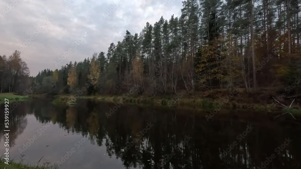 Nelku Red Sandstone Cliffs at the River Salaca in Skanaiskalns Nature Park in Mazsalaca in Latvia, Autumn Time. Sandstone Geological Formation Nelku Red Sandstone Cliffs at the River Salaca in Skanaiskalns Nature Park in Mazsalaca in Latvia, Autumn Time. Sandstone Geological Formation