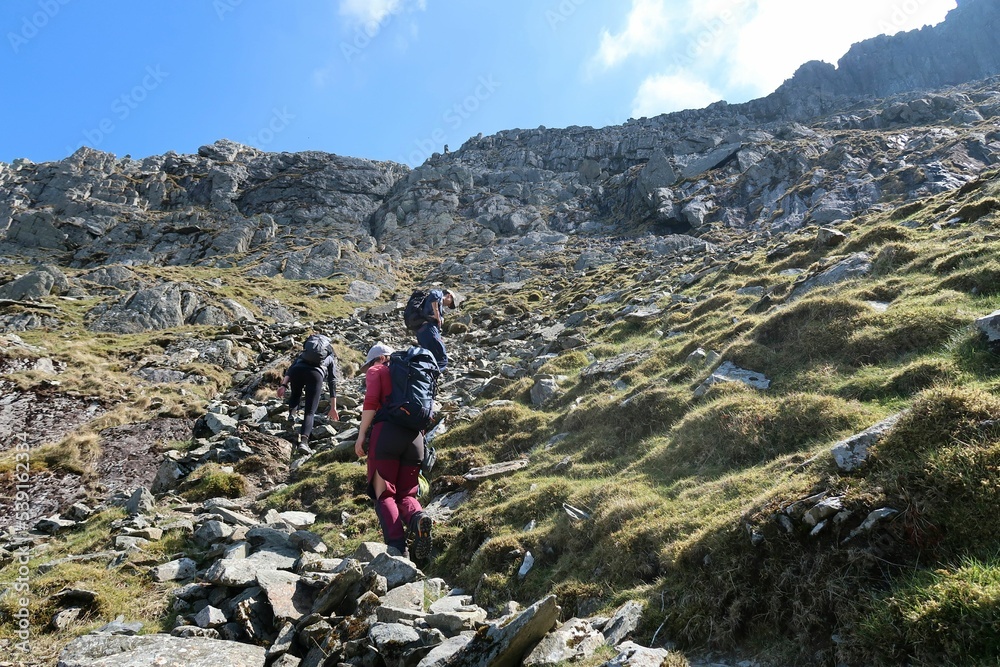 Fototapeta premium Scotland, Snowdonia. Hiking and climbing ridges through the wilderness during Spring time. Some days are sunny some days are rainy, but all of them are an adventure 