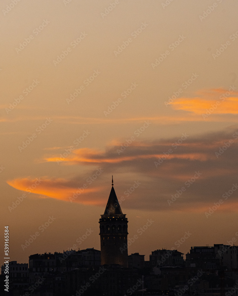 Sultanahmet tower in the centre of Istanbul with colorful evening clouds on the sky