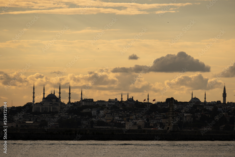 Aya Sofia on the horizon of the Bosporus in Istanbul on a magical yellow evening