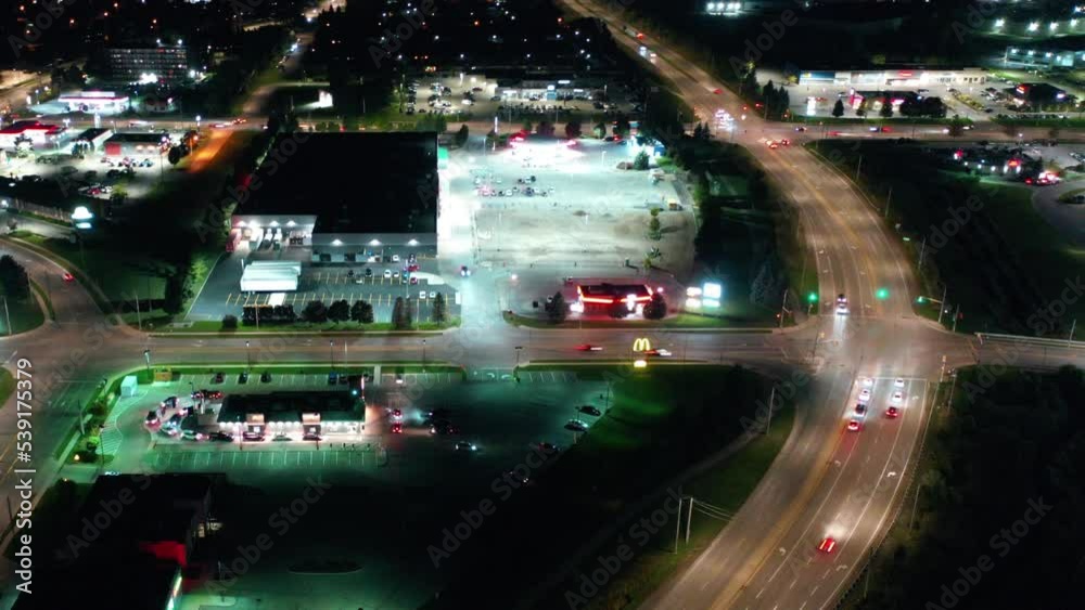 Aerial hyperlapse scene of a busy interchange at night 4K Aerial hyperlapse scene of a busy interchange at night 4K