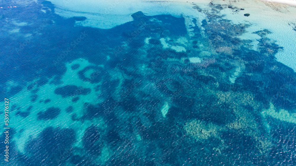 Fototapeta premium Aerial top view of Kabatepe beach in summer, clear nice water in a marvelous Turkish beach near Çanakkale