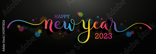 HAPPY NEW YEAR 2023 colorful gradient brush calligraphy banner with bokeh on black background