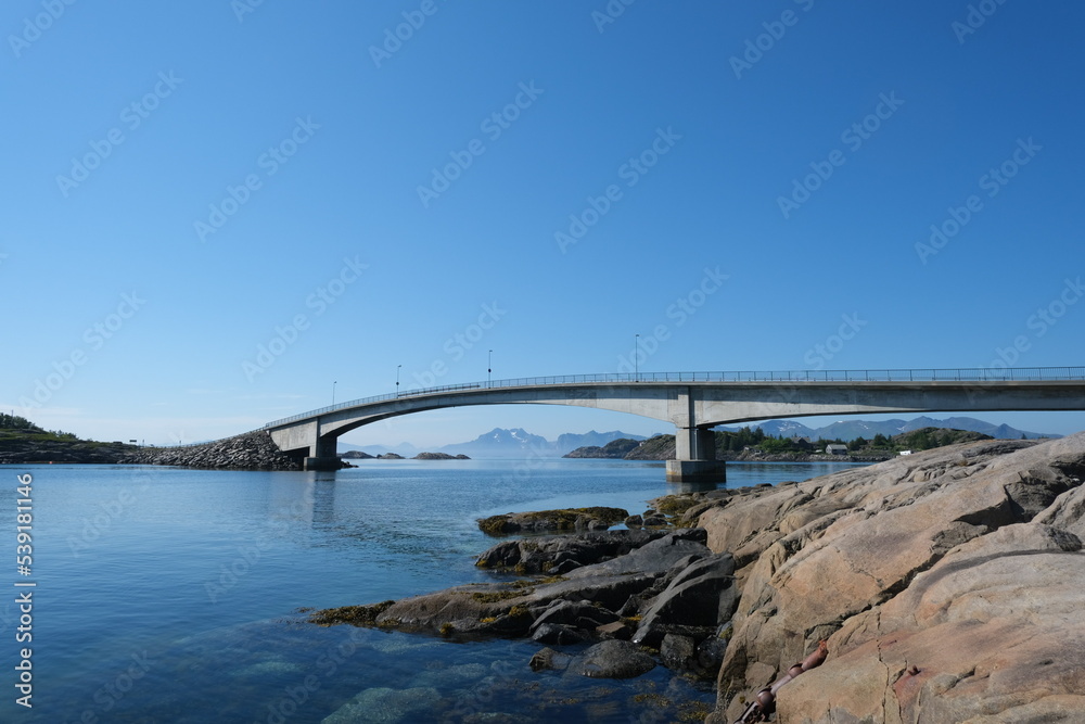 Fjord bridge on the blue sea and blue sky background Fjord bridge on the blue sea and blue sky background