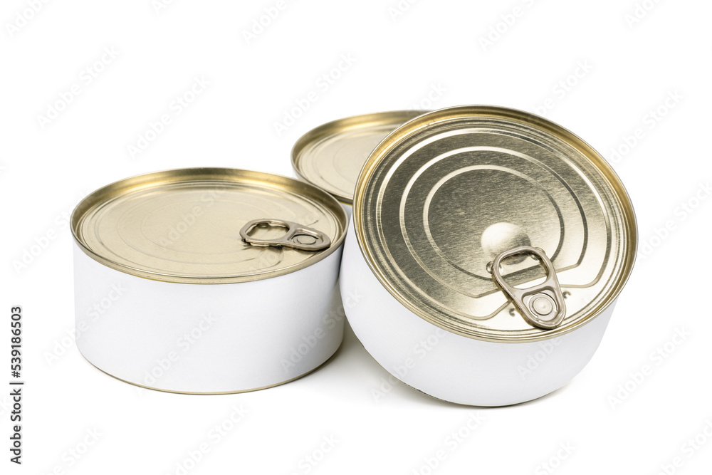 Cans of conserved food. Canned Meat. Metal cans. Close-up various metal and white tin can on white background separated shot. Cans of conserved food. Canned Meat. Metal cans. Close-up various metal and white tin can on white background separated shot.
