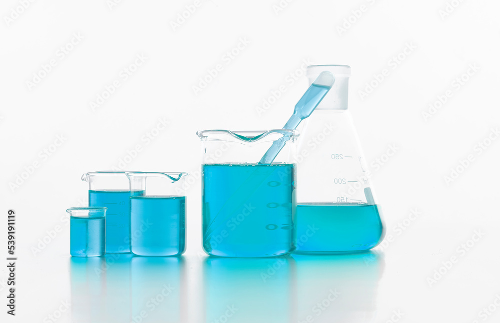 Set of chemical flasks with blue substance in lab Set of chemical flasks with blue substance in lab