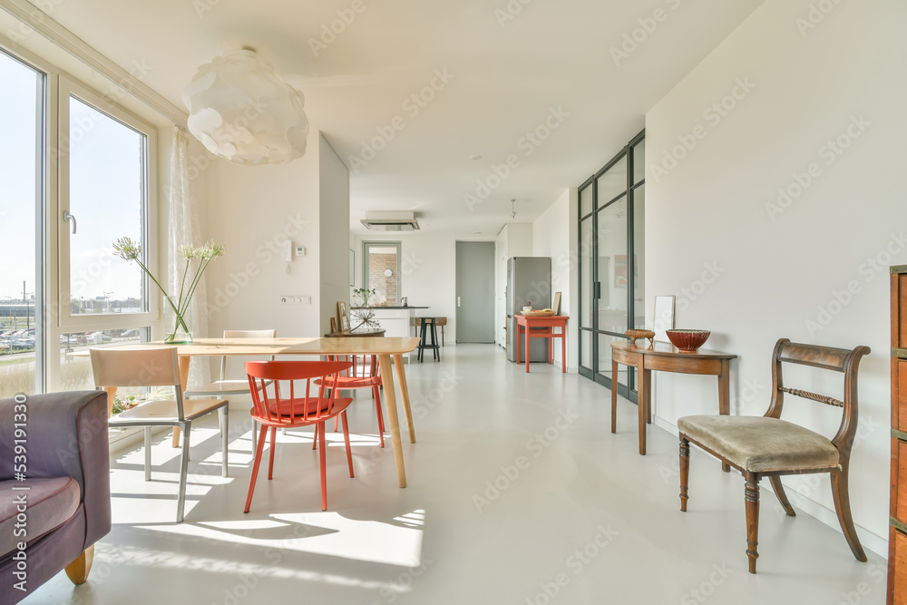 Modern Home With Furniture next to a kitchen Modern Home With Furniture next to a kitchen