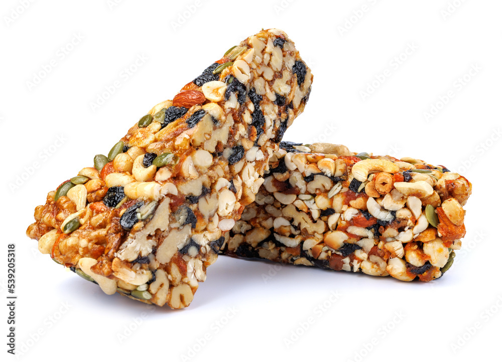 Two pieces of gozinak from different nuts isolated on white background. Two pieces of gozinak from different nuts isolated on white background.